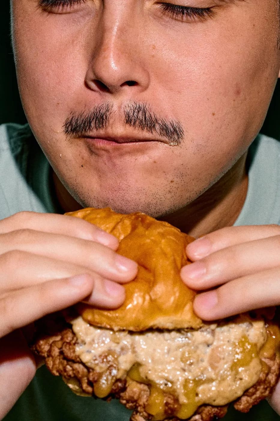 A big bite of a Scratch burger