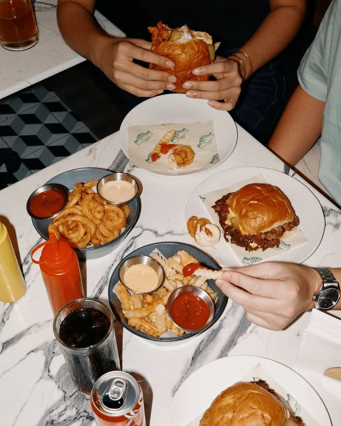 Overhead table of Scratch burgers and fries