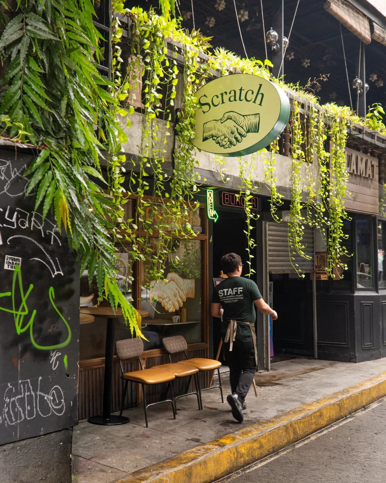Vine-covered Scratch storefront on Don Pedro Street