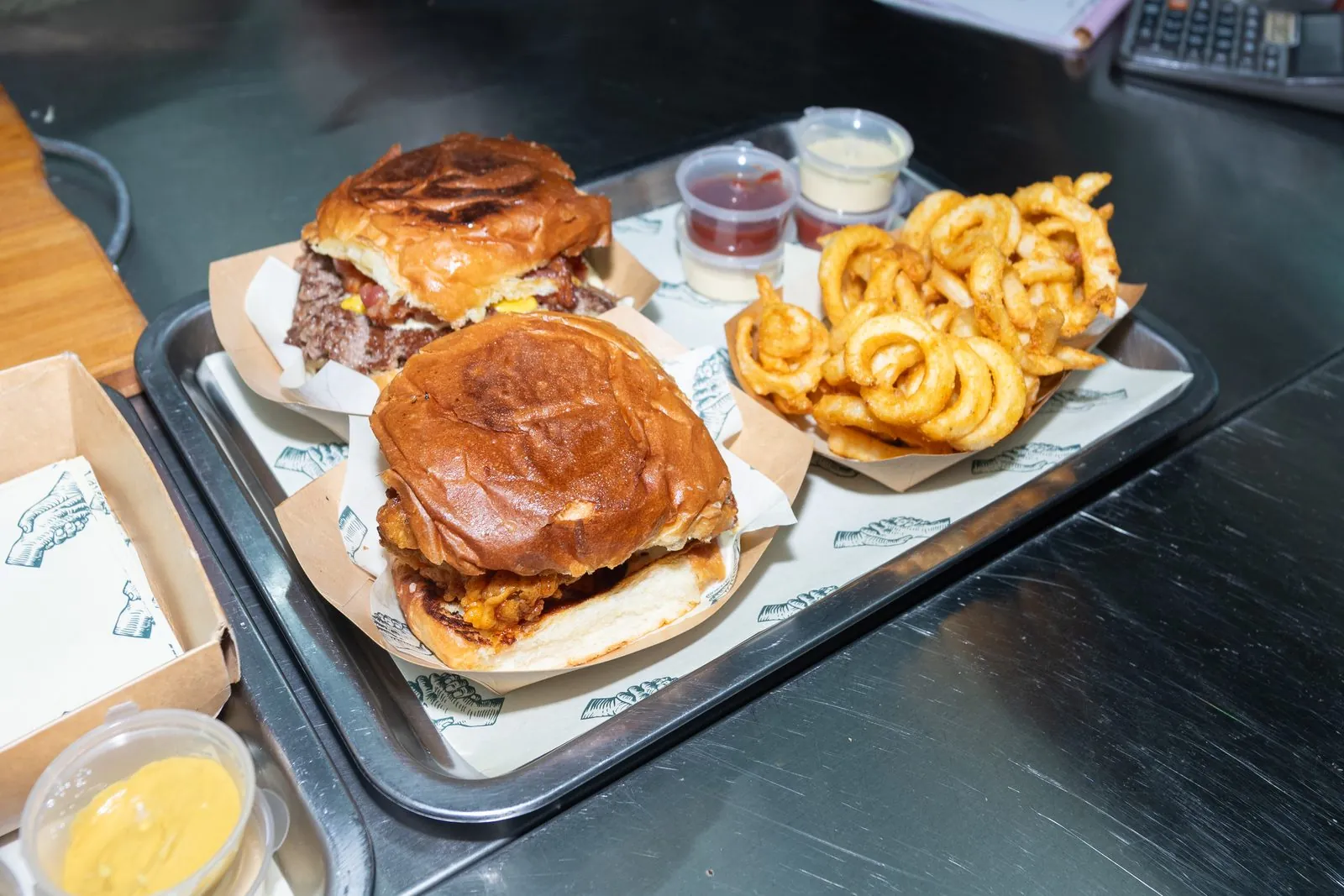 Smash burgers and twister fries on the Scratch Burger Truck counter